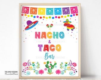 May include: A framed print with the words "NACHO & TACO BAR" in colorful letters. The image features festive Mexican-themed illustrations, including a sombrero, maracas, and a piñata. The words "INSTANT DOWNLOAD" are at the top.