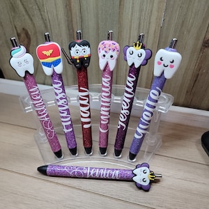 Dental Pens with cute tops for any one who loves the Dental field. You can add a name or do without, also you can pick plain or glitter