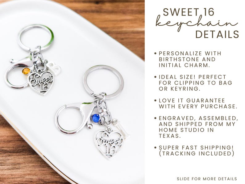 May include: Two silver keychains with a heart-shaped charm that says "Sweet 16". Each keychain has a clip and a small charm. The keychains are on a white tray. The text on the image says "Sweet 16 keychain details".