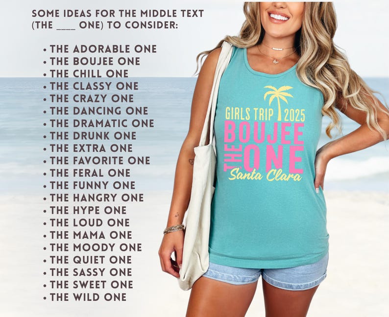May include: A teal sleeveless tank top featuring a yellow palm tree graphic and the text GIRLS TRIP 2025 THE BOUJEE ONE Santa Clara in yellow and pink. The shirt is paired with light blue denim shorts and a white tote bag over the shoulder.