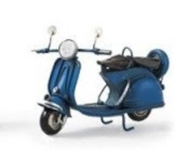 miniature toy vespa, black and blue with shiny metal