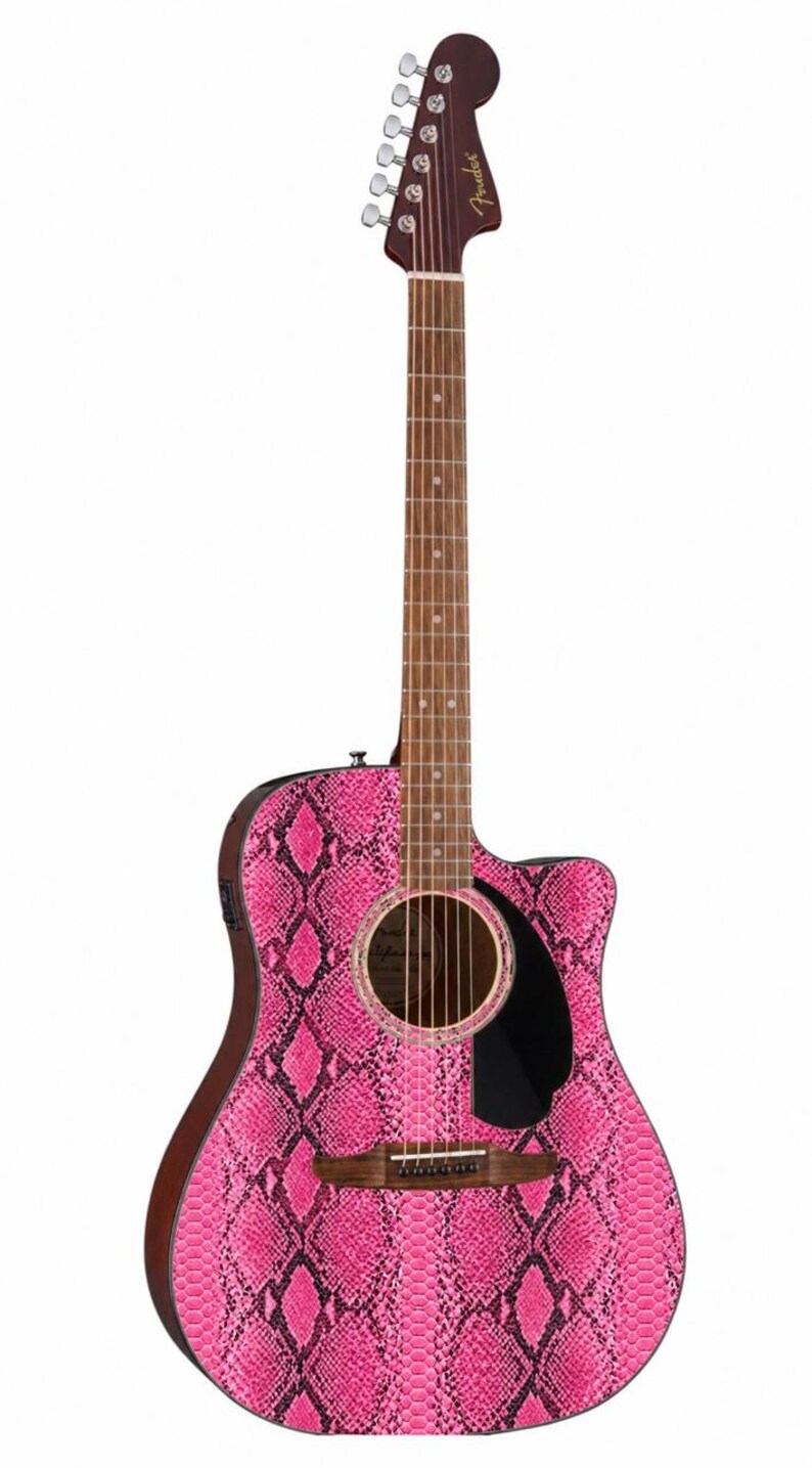 May include: Acoustic-electric guitar with a vibrant pink snakeskin pattern on the body. Features a dark brown neck and headstock, with silver tuning pegs. The guitar has a black pickguard and a sound hole.