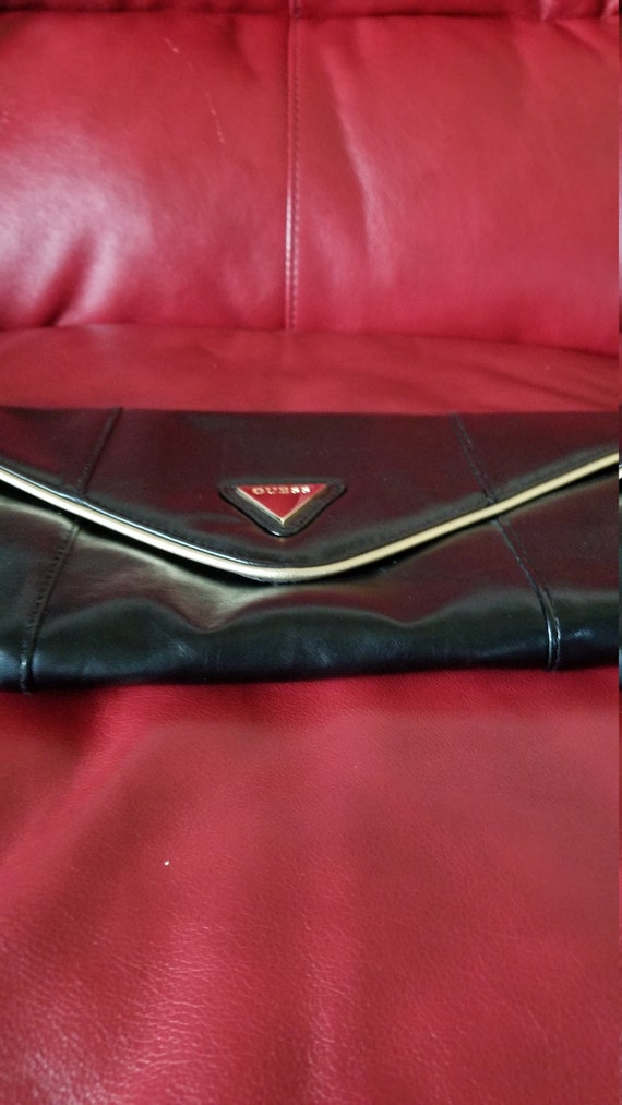 Black Guess Clutch Bag With Goldtone Trim - image 3
