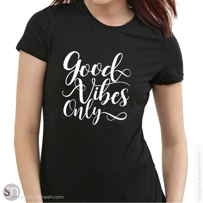 May include: Black t-shirt with white text that reads "Good Vibes Only" in a cursive font.