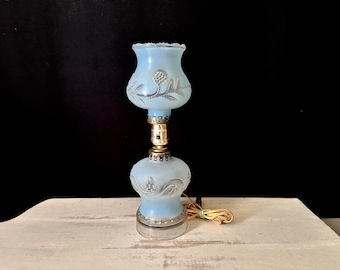 Lámpara de tocador Leviton azul de la década de 1940