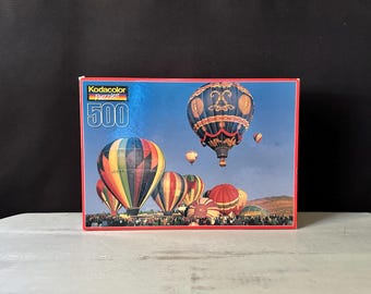 熱気球ジグソーパズル（120、252、500ピース） - 緑豊かな風景の上を