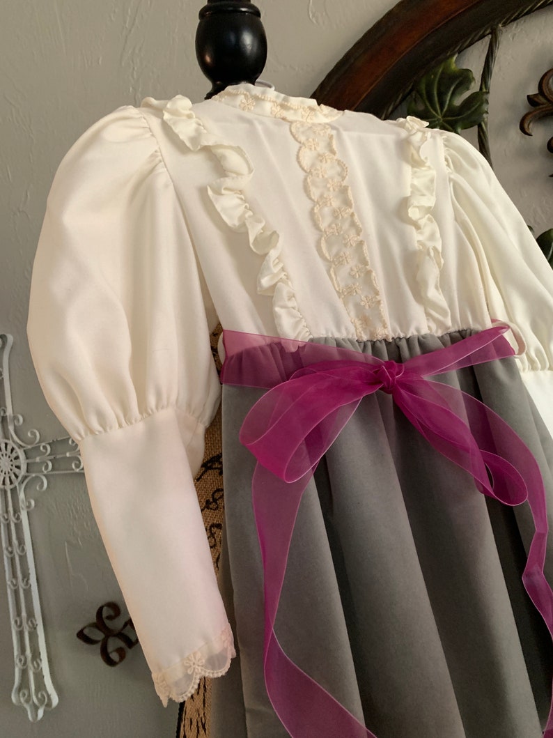 Toddler\u2019s Ruffled Bodice Dress With Gray Velvet Skirt And PurplePink Bow