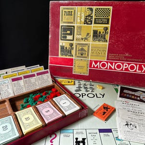 Jeu de société « Monopoly » PARKER BROTHERS 1964 complet dans sa boîte rouge d'origine