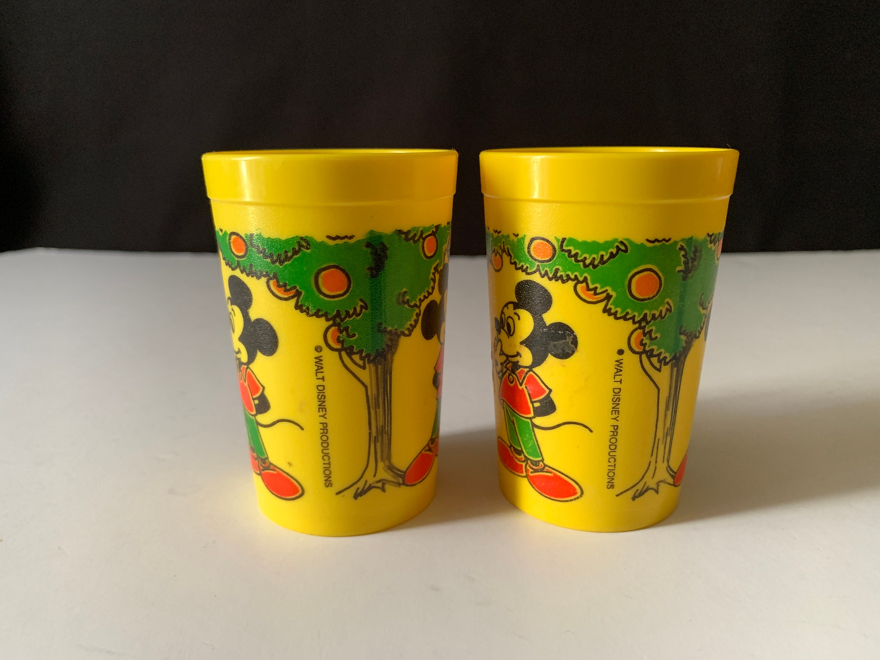 Pair of Vintage 1950s Yellow Plastic Eagle Juice Cups MICKEY and