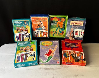 4 Packs of Disney Collector Cards. 15 Cards per Pack. Impel 1991