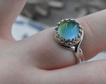 Mood ring, sterling silver, changing color 10mm stone with crown bezel.