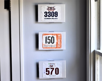 BibMount™ Race Bib Frame Display - Invisible and Adjustable Wall Mount or Shelf Stand.