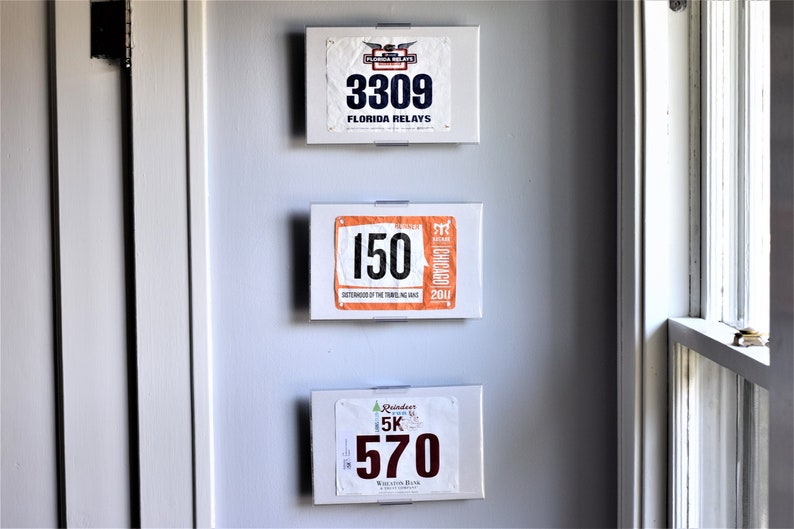 BibMount™ Race Bib Frame Display Invisible and Adjustable Wall Mount or Shelf Stand. image 1