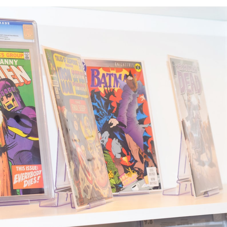 ComicMount\u2122 Comic Book Frame Display System \u2013 Invisible and Adjustable Wall Mount or Shelf Stand.