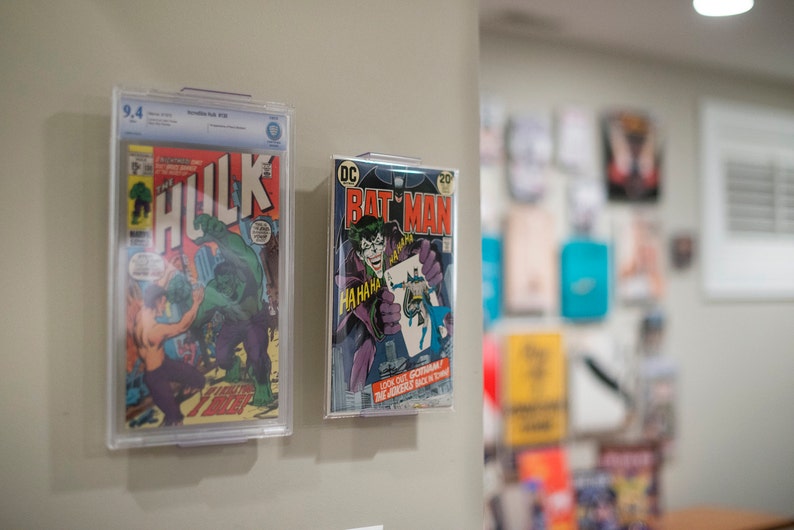 Comicmount Comic Book Frame Display System Invisible And Adjustable Wall Mount Or Shelf Stand