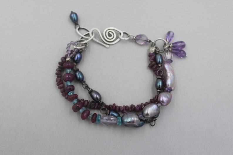 Triple Strand Bracelet With Rubies, Black Pearls, Amethyst, Apatite and