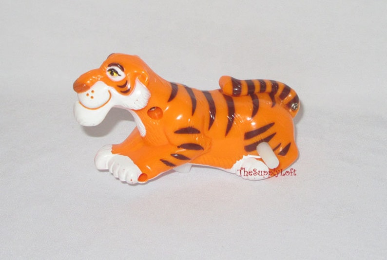 TheSupplyLoft1 Collectible Gift Vintage Rajah Wind-up Toy from Disney Aladdin from 1992