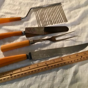Vintage farm house kitchen serving cooking utensils gadgets carving knife meat fork tomato slicer  cake knife  camping picnic