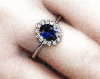 White gold ring with sapphire and diamonds