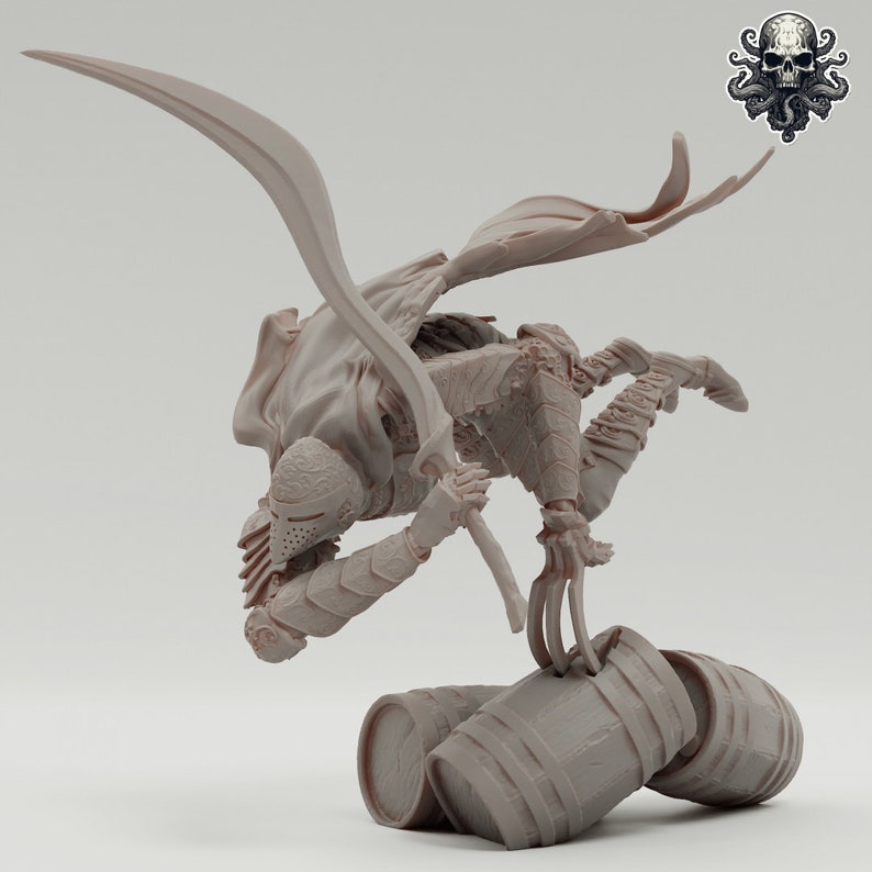 May include: A gray, detailed figurine of a warrior in a hooded cloak, holding a sword and standing on two barrels. The warrior is in a dynamic pose, with one leg raised and the sword held high.