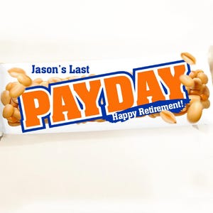 May include: A white candy bar wrapper with the words "Jason's Last PAYDAY Happy Retirement!" printed on it. The candy bar is decorated with peanuts.