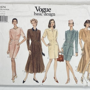 May include: A Vogue basic design sewing pattern envelope 1574, size 8-10-12, featuring illustrations of five different dress and suit styles. The designs include various button-front dresses, a skirt suit, and a coat-style dress in shades of pink, brown, cream, and teal.