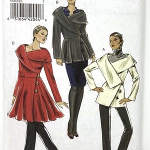 May include: Vogue sewing pattern V8465 for a jacket with a wide collar and button closures. The illustration shows three variations: a red jacket, a dark grey jacket, and a white jacket, all featuring long sleeves and a flared silhouette.
