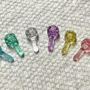 Medium faceted globe lights in pastel colors,  6 colors, 50 per package.