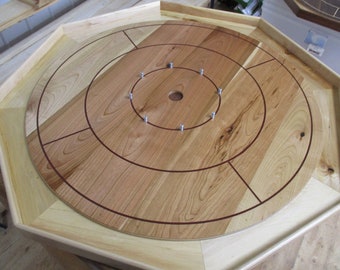 Crokinole board with 26 inch tournament size cherry top and maple bottom and sides.