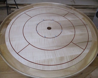 Round sided Crokinole board with 26 inch tournament size maple top and maple sides.