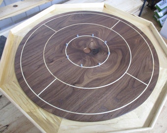 Crokinole board with 26 inch tournament size with walnut top and maple bottom and sides.