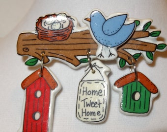 A fun brooch to wear, bird, nest  and tree houses,  { HOME SWEET HOME],circa 1980s- 3  inches wide