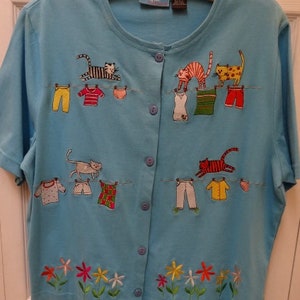 TURQUOISE JACKET, women, size extra large, short sleeve, button down, Onque Casual brand, appliques  embroidery cats and clothesline motif