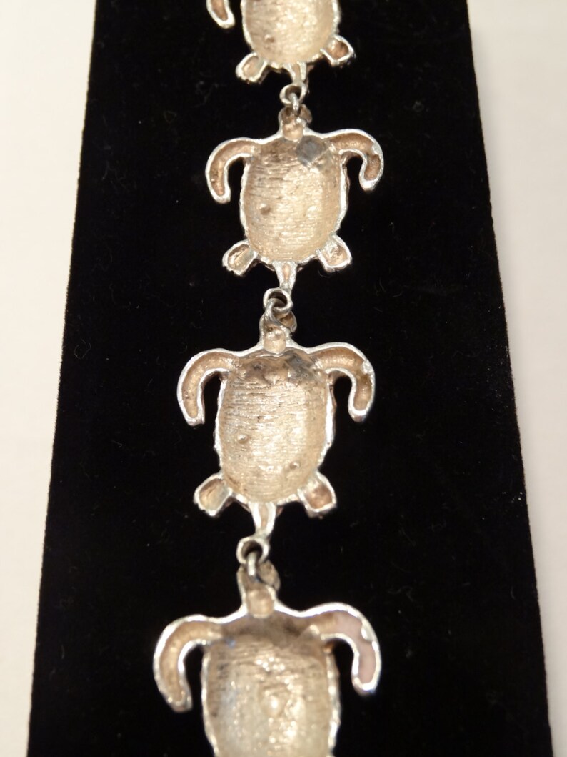 ETSY sale item--BRACELET size 8,security clasp.circa 1990/'s Sterling silver #925 7 large Turtles diamond facet cut SEALIFE