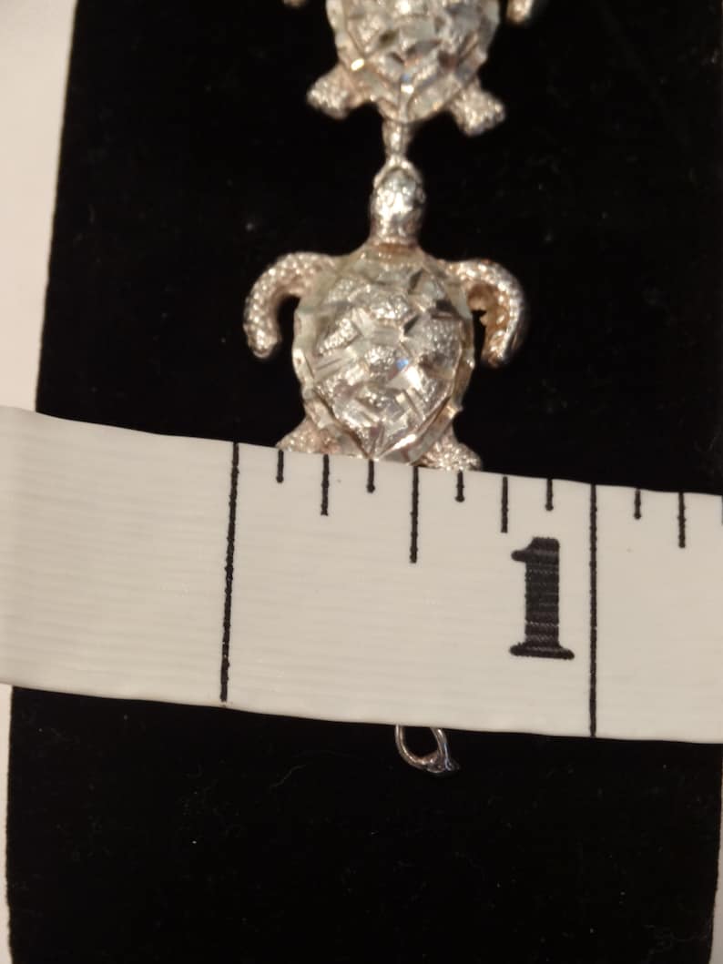 ETSY sale item--BRACELET size 8,security clasp.circa 1990/'s Sterling silver #925 7 large Turtles diamond facet cut SEALIFE
