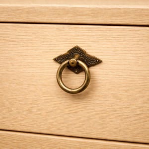 Bouton heurtoir de porte ou de tiroir et base "losange fleuri"