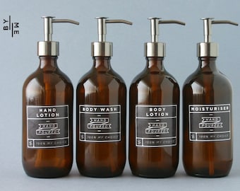 Amber glass bottle soap dispenser with metal pump and designer decal