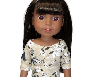 14" doll top.  Tan dolman tee with floral print.  Fits Wellie Wishers.