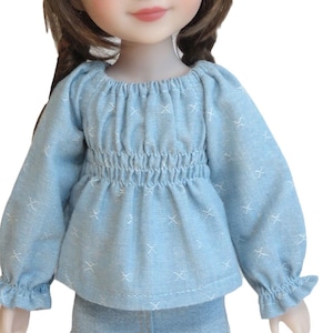15" doll top.  Porcelain blue top with shirred waist and long sleeves.  Fits Ruby Red Fashion Friends.