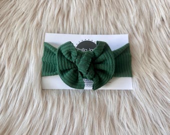 Groene trui gebreide babyhoofdband: moderne hoofdband met strik