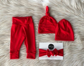Conjunto de leggings rojos para bebé: pantalón holgado, gorro y diadema.