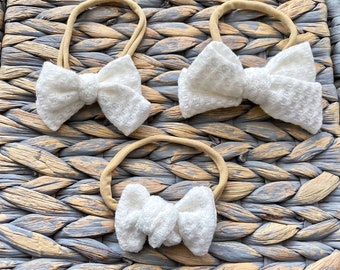 Ivory Waffle Bow Baby Headband: Pinwheel Nylon Headband
