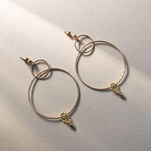 Ava Earrings. Gold. Silver. Hoops. Dangling earrings. Casual. Jewelry. Accessories. Fashion. Women. Minimalist. Edgy. Spikes. Gifts for her. image 1