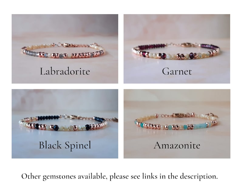 May include: Four bracelets with different gemstones: labradorite, garnet, black spinel, and amazonite. Each bracelet has a rose gold chain and white beads.