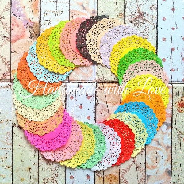 4 1/8" French Pastry Rainbow Paper Doilies, 1 pack of 24 colors. Perfect for any creation.