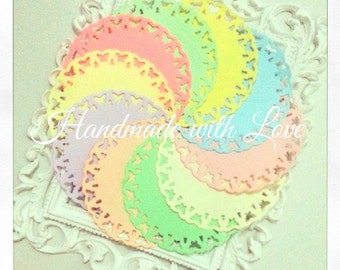 4" Pastel Butterfly Paper Doilies. 1 pack of 10pcs. Perfect for your card making, scrapbooking. and many other projects.