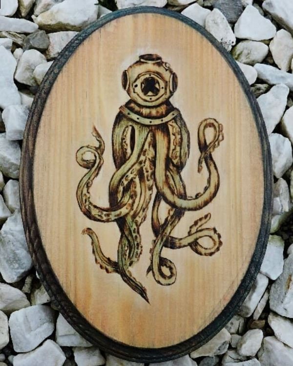 Octopus Clock handmade by my dad with woodburning tools (i wasn't