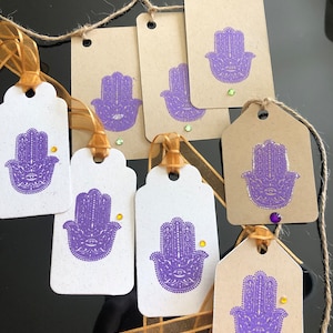 Namaste! One-of-a-kind set of Hamsa purple embossed gift tags on cardstock with rhinestone highlight. Set of 8 (3 sizes).