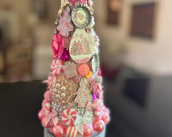 Perfectly pink holiday tree with sparkles, pearls and peppermints. Eleven inches of pink whimsey for your Christmas decor.