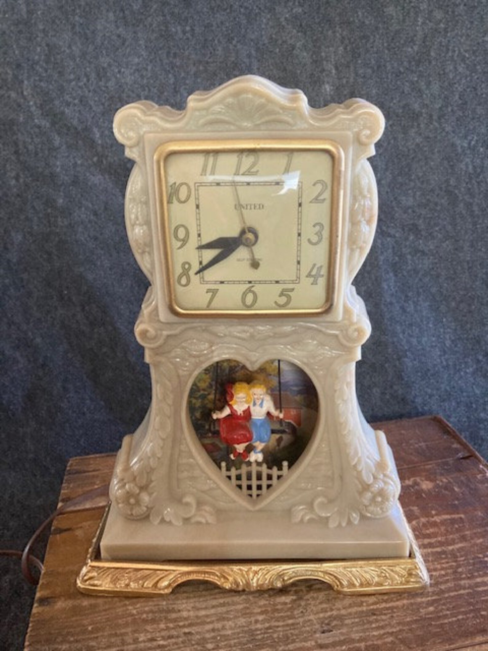 United clock with swinging children Etsy